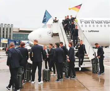  ?? Reuters ?? The Germany team as they arrive at the Vnukovo Internatio­nal Airport in Moscow yesterday. Germany are aiming to join Brazil as five-time winners of the World Cup.