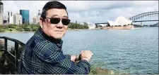  ?? LU WANG ?? After falling sick on a cruise with his wife, Ming Wang, seen in Sydney, Australia, was hospitaliz­ed for 74 days before dying from COVID-19 in June at 71.