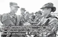  ?? — Gambar Bernama ?? BERSATU: Sebahagian peserta Eksesais Keris Strike siri 21/2017 antara tentera darat Malaysia dengan United States Army Pacific (USARPAC) beramah mesra selepas perasmian oleh Hasagaya.