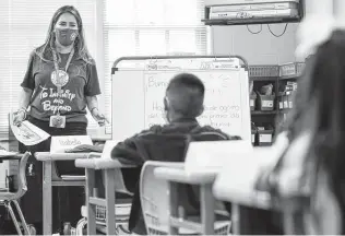  ?? Jon Shapley / Staff photograph­er ?? Nothing gets past a teacher. Amid heavy criticism, Gov. Greg Abbott and TEA expanded their new teacher shortage task force from only two teachers to two dozen.