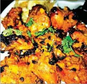  ?? JOSHUA PURUSHOT- ?? Chicken garlic tikka is also one of Swagat’s regulars’ favourites.