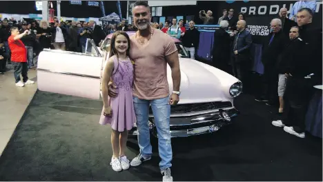  ?? ALYN EDWARDS ?? Alys Mia Benloulou and father Olivier as she sells her customized 1955 Lincoln for $57,000, all donated to the Canadian Cancer Society.