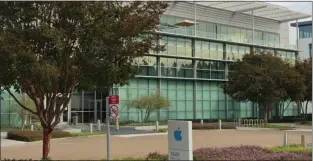  ?? STAFF ARCHIVES ?? Apple logo is visible outside one of the tech company's offices at 3689 Kifer Road in Santa Clara. According to a filing with a state Employment Developmen­t Department, the company plans to cut an estimated 371jobs from this location.