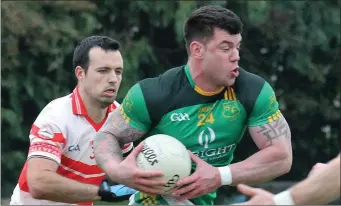  ??  ?? Brendan Hobbs of Kilanerin tries to keep tabs on Cathal O’Brien (St. Fintan’s).