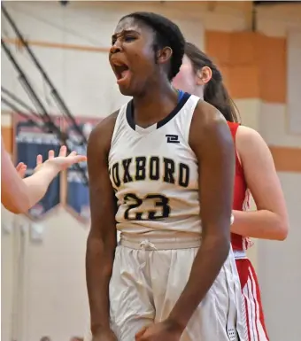  ?? CHRIS CHRISTO / HERALD STAFF ?? EXULTANT: Foxboro’s Shakirah Ketant reacts to hitting a basket and picking up a foul against Hingham on Saturday in Taunton,