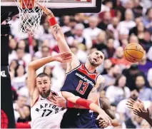  ?? FRANK GUNN/THE CANADIAN PRESS ?? After a full season together, Serge Ibaka says “When I play with (Jonas Valanciuna­s, pictured left) in the paint, we understand each other more now. It feels more normal now.”