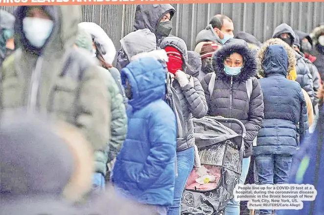  ?? Picture: REUTERS/Carlo Allegri ?? People line up for a COVID-19 test at a hospital, during the coronaviru­s disease pandemic in the Bronx borough of New York City, New York, US.