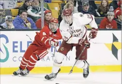  ?? Icon Sportswire via Getty Images ?? BU’S Logan Cockerill, left, is confident despite the Terriers having played the fewest games (15) of those in the 16-team NCAA field.