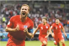  ?? Matthias Hangst / Getty Images ?? Harry Kane of England celebrates after scoring his and his team’s second goal of the World Cup against Tunisia in Russia.