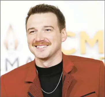  ?? GETTY IMAGES ?? Morgan Wallen was charged with felony reckless endangerme­nt and disorderly conduct after he allegedly threw a chair from the roof of Chief’s bar in downtown Nashville on Sunday night.