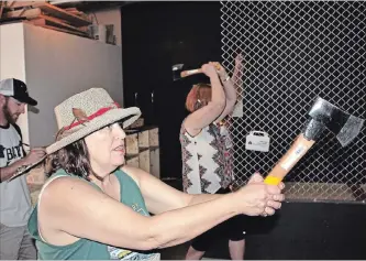  ?? SPECIAL TO THE ST. CATHARINES STANDARD ?? Axe throwing at a past Amazing Race Niagara event.