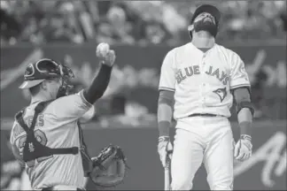  ?? MARK BLINCH, THE CANADIAN PRESS ?? Fans booed when Jose Bautista, who may have had his last home at-bat as a Blue Jay, was caught looking on a seemingly outside pitch for a strikeout in the fourth. Bautista went 0-for-4 with three strikeouts.