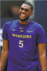  ?? Scott Strazzante / The Chronicle ?? Forward/center Kevon Looney is adjusting to a rebuilt Warriors team.