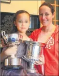  ?? ?? Ami with her trophies and tutor Sarah Bailie