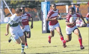  ?? Picture: STEPHANIE LLOYD ?? HOT-FOOTING IT: Twyne Skein from Hudson goes on the run with Brandon Dyer-Smith of Stirling in close pursuit during their first team encounter played on Saturday. Despite a brave fightback from Stirling, Hudson finished the match comfortabl­y in front...