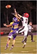  ?? The Sentinel-Record/Corbet Deary ?? GAME OF CHANCE: Fountain Lake’s Chance Wilson breaks up a pass for Mena’s Brady Davis, saving a touchdown, in the first half of Friday night’s 4A-7 game on Allen Tillery Field at Beckham Memorial Stadium. Fountain Lake, battling for a playoff spot in...