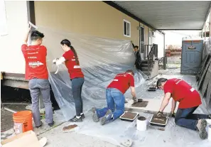  ??  ?? Bank of America, Rebuilding Together Silicon Valley and volunteers joined to repair Tran’s home, which was severely damaged from the recent flooding.