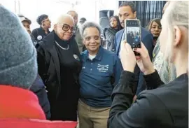  ?? BRIAN CASSELLA AND SHANNA MADISON/ CHICAGO TRIBUNE ?? Top row, from left: U.S. Rep. Jesús “Chuy” García greets supporters at a campaign event on Feb. 19; Cook County Commission­er Brandon Johnson walks to the polls with voters on Monday. Bottom row, from left: Mayor Lori Lightfoot greets supporters during an early vote kickoff event on Feb. 18; former Chicago Public Schools CEO Paul Vallas greets people on Feb. 19.