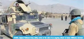  ??  ?? KABUL: Afghan National Army (ANA) arrive at the side of an ongoing attack in Kabul. Militants stormed an intelligen­ce agency training facility in Kabul yesterday, triggering intense fighting with police in the latest attack to hit the Afghan capital....
