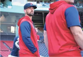  ?? RACHEL O’DRISCOLL/BOSTON RED SOX ?? Portsmouth High School graduate Mike Montville, left, watches Red Sox batting practice before a game against the Kansas City Royals at Fenway Park in September 2022. Montville, a hitting coach with Red Sox Triple-A affiliate Worcester Red Sox, was told Monday the organizati­on wasn’t bringing him back in 2024.