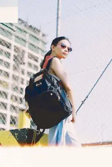  ?? Photos by REDGE HAWANG Styled by TIN SARTORIO Modeled by AIJALONICA LEI ?? Pacsafe Citysafe CX anti-theft backpack in black