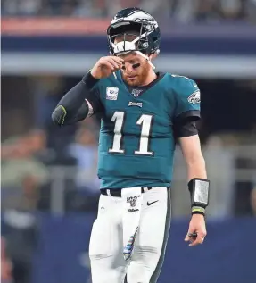  ?? TIM HEITMAN/USA TODAY SPORTS ?? Quarterbac­k Carson Wentz directs a fine Eagles offense, but their defense could benefit from an impact player at the deadline.