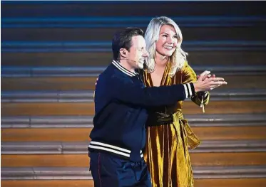  ??  ?? No twerking here: Lyon Norwegian forward Ada Hegerberg (right) dancing with DJ and co-host Martin Solveig after receiving the FIFA Women’s Ballon d’Or award at the Grand Palais in Paris on Monday. — AFP