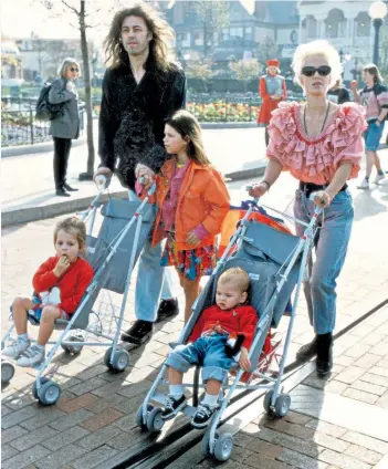  ?? ?? ‘She loved those girls so much’: Yates with Geldof and their daughters during a visit to Euro Disney in 1992