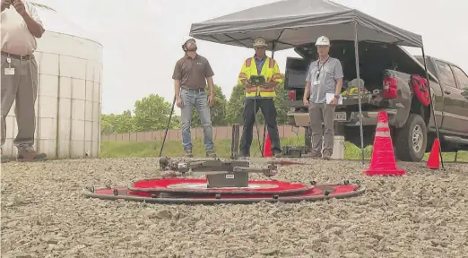  ?? NATHAN ELLGREN/AP ?? In this video image, Dominion Energy drone operators use drones to inspect areas of a power plant in Remington, Virginia, on June 8.