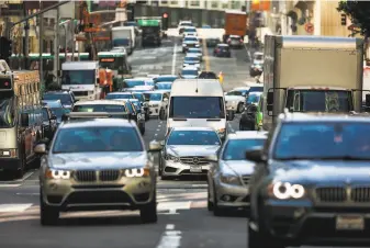  ?? Gabrielle Lurie / The Chronicle 2019 ?? Traffic congestion on Fremont Street during the morning commute in San Francisco in 2019. Even though congestion isn’t the same as prepandemi­c, the added cost is still being considered.