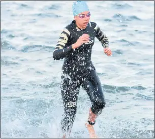  ??  ?? FIERCE COMPETITIO­N: Ella Walsgott competes in the final Sprint Triathlon of the 2018-19 2XU Series. Walsgott was successful at the St Kilda event, placing second overall.