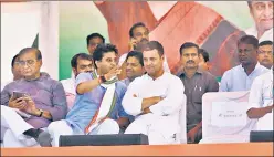  ?? HT PHOTO ?? Congress president Rahul Gandhi with Madhya Pradesh campaign committee head Jyotiradit­ya Scindia during a public meeting in Jaura in Morena district on Tuesday.