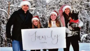  ?? SUBMITTED PHOTO ?? Dean Coleman, his daughters, Kenlee and Maija, and wife Janna got together Saturday to pose for their annual Christmas photo.