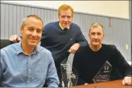  ?? Bill O'Brien ?? From left, John Bysiewicz, John Courtmanch­e and John Tolbert of the Faxon Law New Haven Road Race committee.