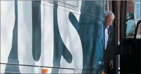  ?? PABLO MARTINEZ MONSIVAIS — THE ASSOCIATED PRESS ?? Democratic presidenti­al candidate Sen. Bernie Sanders, I-Vt. , stepping off his bus as he arrives for a campaign event at The Black Box Theater, Saturday in Indianola, Iowa.