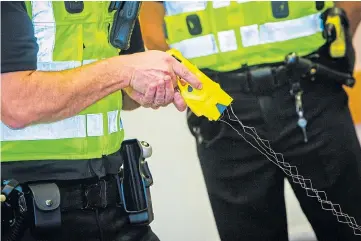  ??  ?? SAFETY: Police Scotland has committed to uplift the number of Taser officers by 1,500.