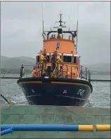  ??  ?? The lifeboat accompanyi­ng the ferry during the recent Kells - Valentia Cycle.