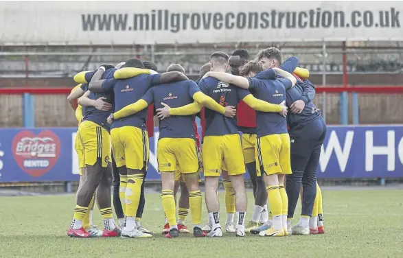  ?? ?? FC Halifax Town showed great team spirit to defeat Aldershot Town 2-0 in the quarter-finals of the FA Trophy. Pic: Ian Moorsman