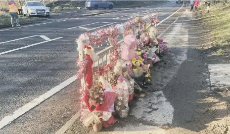  ??  ?? Tributes were left close to the scene of the collision on the A1086 Coast Road between Blackhall Colliery and Horden.