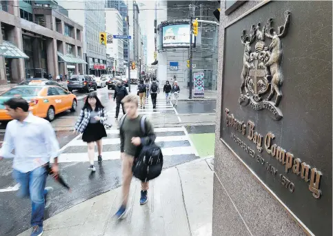  ?? PETER J. THOMPSON ?? Hudson’s Bay Co. missed analyst estimates with a net loss of $201 million, or $1.10 per share, though digital sales rose 12.7 per cent in the second quarter. The retailer is streamlini­ng operations and increasing efficienci­es to save about $170 million...