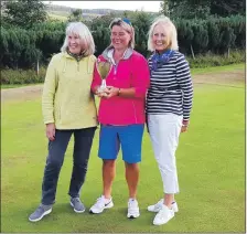  ??  ?? Left: Winner of the Whiting Bay Ladies Open, Gill Lockart, with runners up Elizabeth Paterson and Elizabeth Rankin.