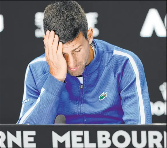  ?? Louise Delmotte The Associated Press ?? Losing in the semifinals at the Australian Open on Friday was a real headache for Novak Djokovic, who had won 33 consecutiv­e matches in Melbourne since 2018. But expecting this to be the beginning of the great champion’s end is probably a bit premature.