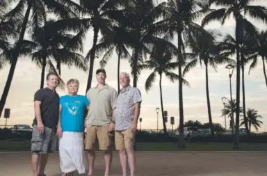  ?? Kent Nishimura, for The Washington Post ?? From left, Terry Anderson, Karolyn Anderson, Travis Anderson and John D. Anderson Jr. traveled to Oahu in Hawaii, where John D. Anderson’s ashes are to be interred underwater in the remnants of his old turret aboard the USS Arizona. He will rejoin his...