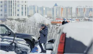  ?? /Reuters ?? Seeking the truth: Vasily Dubkov, lawyer for the Navalny family, arrives at the regional prosecutor‘s office in the city of Salekhard, Russia, on Monday. Russian opposition leader Alexei Navalny died on Friday in a prison camp.