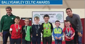  ??  ?? Sligo Rovers’ Rhys McCabe with some of Ballygawle­y Celtic’s players at the club’s youths awards night.