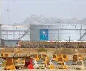  ?? AP PHOTO/AMR NABIL ?? Storage tanks are seen in 2021 at the North Jiddah bulk plant, an Aramco oil facility, in Jiddah, Saudi Arabia.