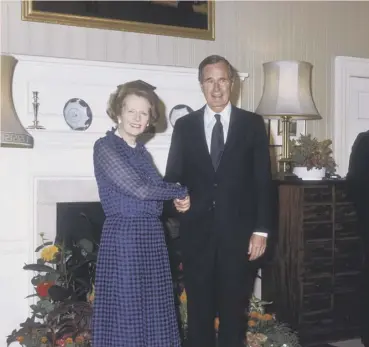  ??  ?? Margaret Thatcher meets the then Vice-president George Bush
