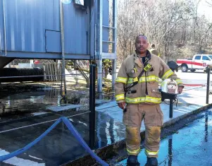  ?? The Sentinel-Record/Grace Brown ?? Q Hot Springs Fire Department Capt. Kenneth Byrd during a break in a training exercise Thursday at the department’s training grounds.