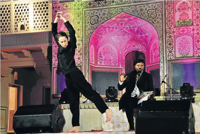  ?? Pictures: Wendel Fernandes ?? STORYTELLE­R Ben Okri, the acclaimed poet, novelist, essayist and playwright, is accompanie­d by a dancer as he performs “The Griot“as part of an evening of entertainm­ent at the majestic Amber Fort.