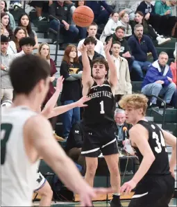  ?? MIKE CABREY — MEDIANEWS GROUP ?? Garnet Valley’s Quinn O’Hara shoots against Methacton on Friday night. O’Hara hit five 3-pointers to power a 64-53 win for the Jaguars.